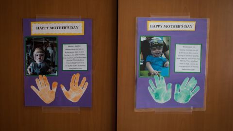Mother's Day cards given to Nicole McDonald on behalf of her sons hang on a cabinet at Blythedale Children's Hospital.