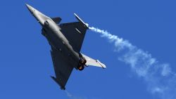 A Dassault Aviation Rafale fighter jet performs during a flight display on June 19, 2017 at the International Paris Air Show in Le Bourget outside Paris. / AFP PHOTO / POOL / CHRISTOPHE ARCHAMBAULT        (Photo credit should read CHRISTOPHE ARCHAMBAULT/AFP/Getty Images)
