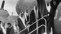 31st August 1945:  Five sons of King Abdul Aziz Ibn Saud of Saudi Arabia board a plane at Herne Airport in Hampshire. They are the Amir Faisal (later King Faisal), Amir Mohammed, Amir Fahd (later King Fahd), Amir Abdullah Al Faisal and Amir Nawaf. On the left is the Saudi Ambassador in London.  (Photo by William Vanderson/Fox Photos/Getty Images)