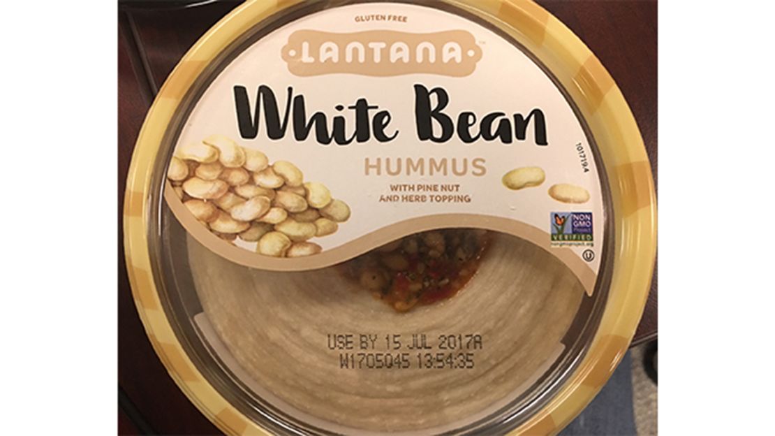 Lantana white bean hummus with pine nut and herb topping.