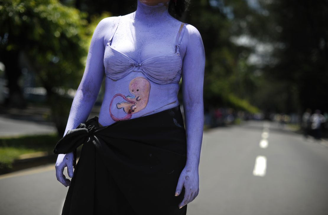 A woman participates in a march on the International Day of Action for the Decriminalization of Abortion in 2012.