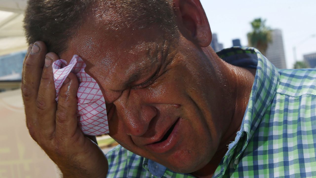 Steve Smith wipes sweat from his face as temperatures climb to near-record highs in Phoenix on Monday, June 19. <a href="http://www.cnn.com/2017/06/20/us/gallery/western-heat-wave/index.html" target="_blank">A punishing heat wave</a> is breaking records in parts of the western United States, causing massive power outages and flight cancellations.