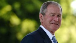 Former United States of America President George W. Bush looks on upon his arrival at the Theresanyo Primary school, on April 4, 2017, in Gaborone, during a two day official visit in Botswana.