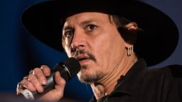 Actor Johnny Depp introduces his film, The Libertine, to the audience at 'Cineramageddon', the outdoor cinema venue, at the Glastonbury Festival of Music and Performing Arts on Worthy Farm near the village of Pilton in Somerset, South West England, on June 22, 2017.  