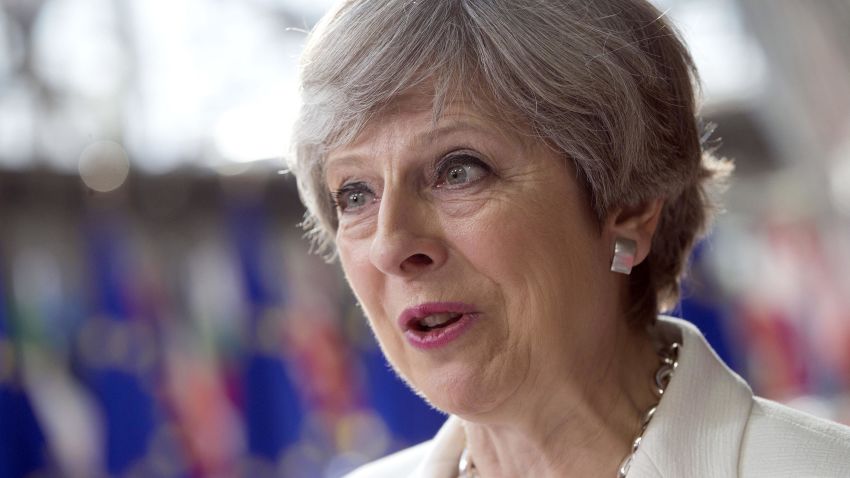 British Prime Minister Theresa May speaks with the media as she arrives for an EU summit at the Europa building in Brussels on Friday, June 23, 2017. European Union leaders meet in Brussels on the final day of their two-day summit to focus on ways to stop migrants crossing the Mediterranean and how to uphold free trade while preventing dumping on Europe's markets. (AP Photo/Virginia Mayo)