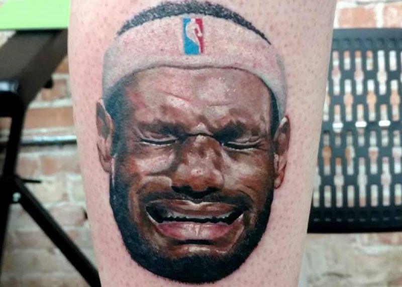 Man takes his disdain for LeBron James to the next level  by tattooing  his crying face on his leg  CNN