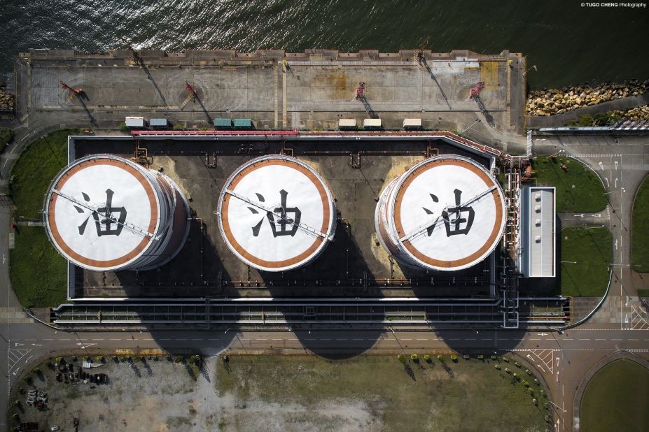 In the northwest of Hong Kong, oil storage tanks at power stations are painted with huge Chinese characters that represent the word "oil". 