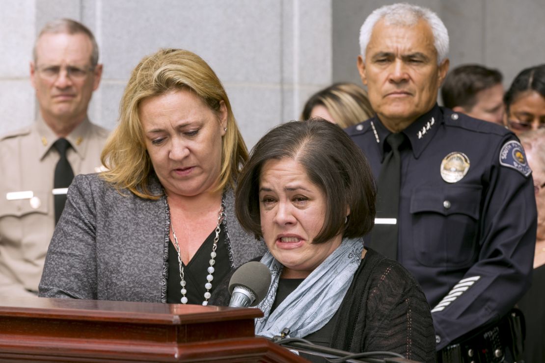 Ana Estevez, the mother of Aramazd Andressian Jr., speaks during a May 17 news conference in South Pasadena, California, as a family friend and Police Chief Arthur Miller stand beside her.