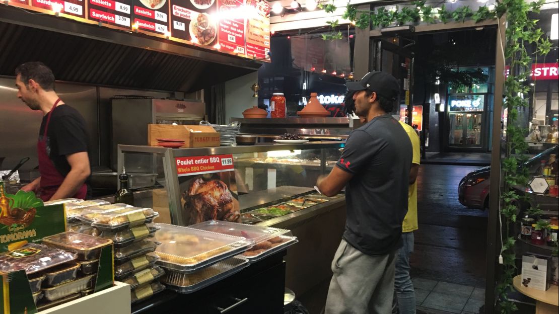 Ahmad Badawi, left, an immigrant from Egypt, wanted to work for his food rather than take it free. The restauranteurs needed a cook, so they hired him.