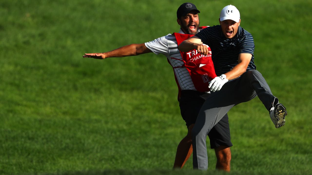 Spieth tossed his club before body-slamming his caddie after holing out from the sand.