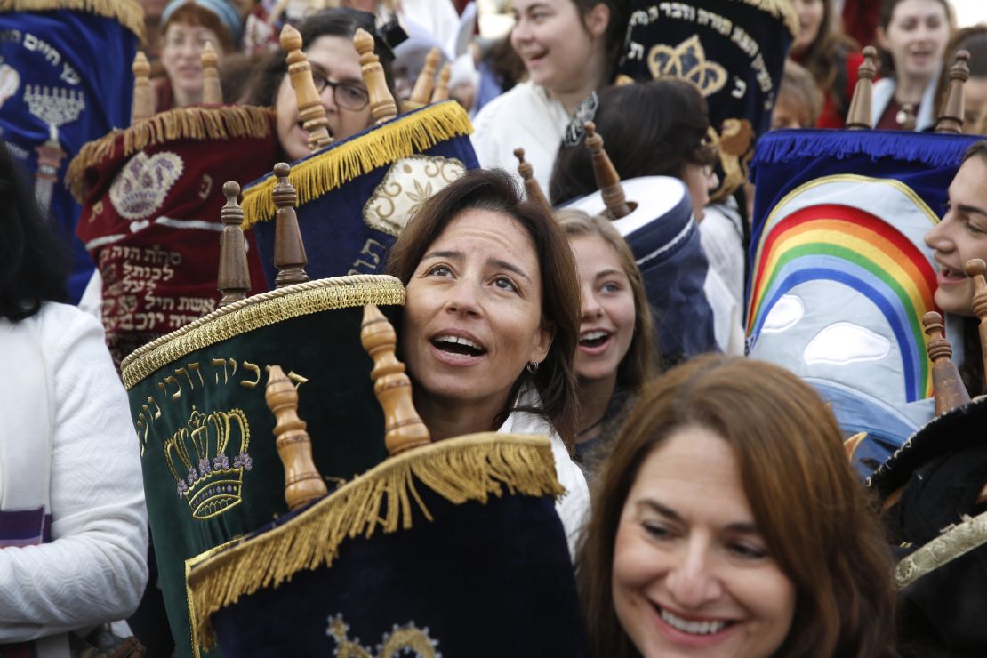 The religious group Women of the Wall, with a Torah scroll in the women's section of the Western Wall