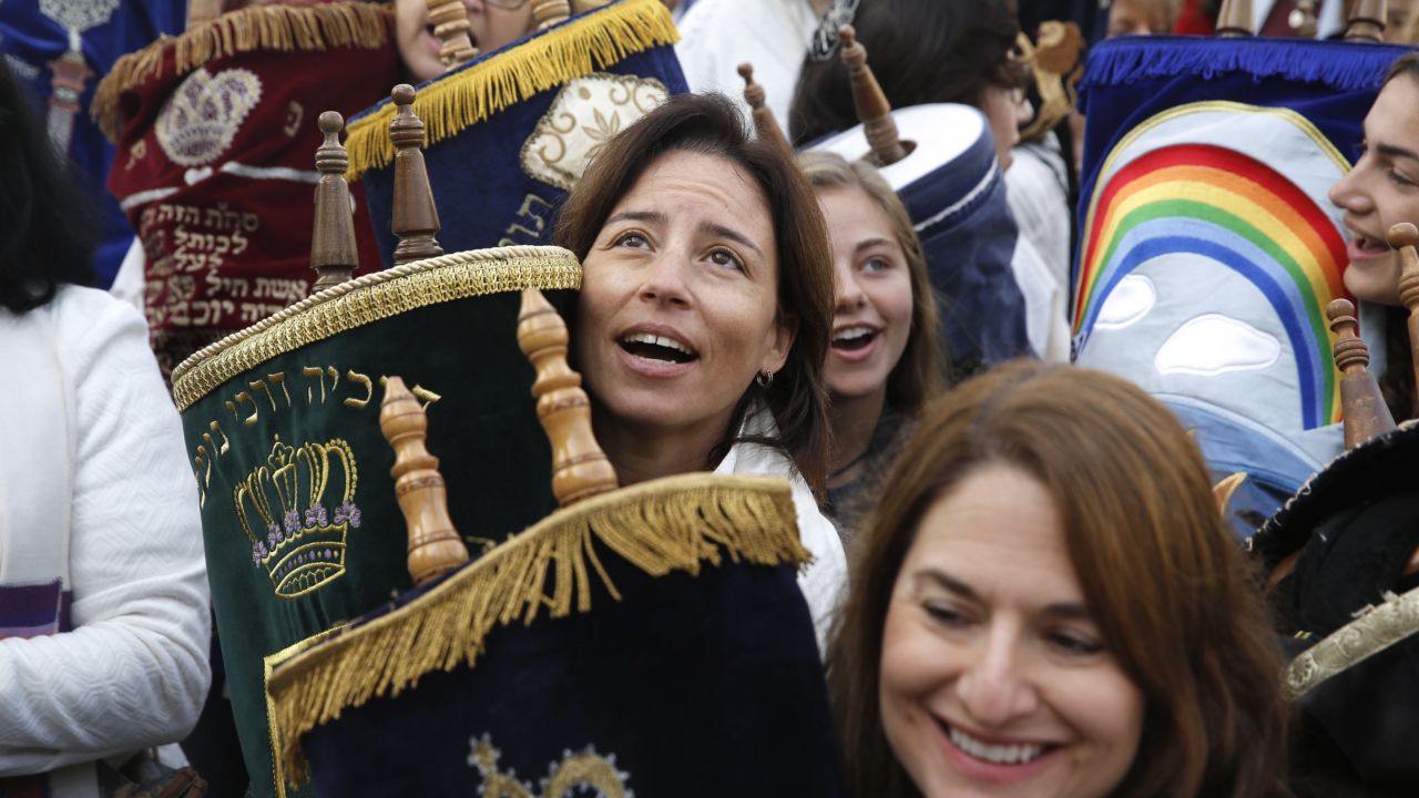 The religious group Women of the Wall, with a Torah scroll in the women's section of the Western Wall