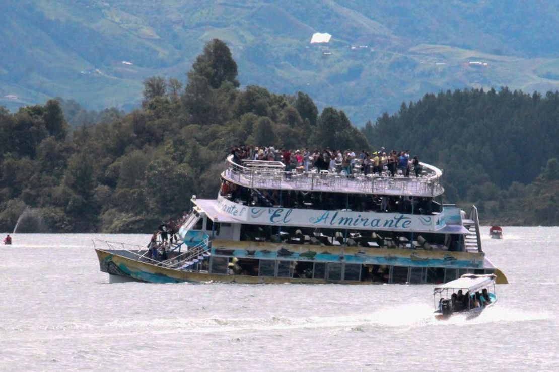Tourist boat El Almirante is seen taking on water in the Guatape, Antioquia  on June 25, 2017.