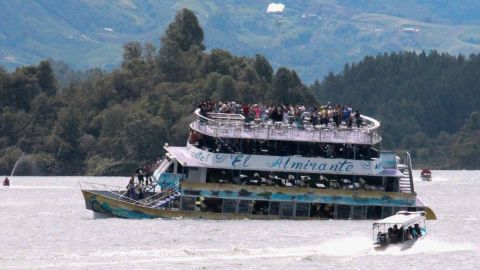 Tourist boat El Almirante is seen taking on water in the Guatape, Antioquia on June 25, 2017.