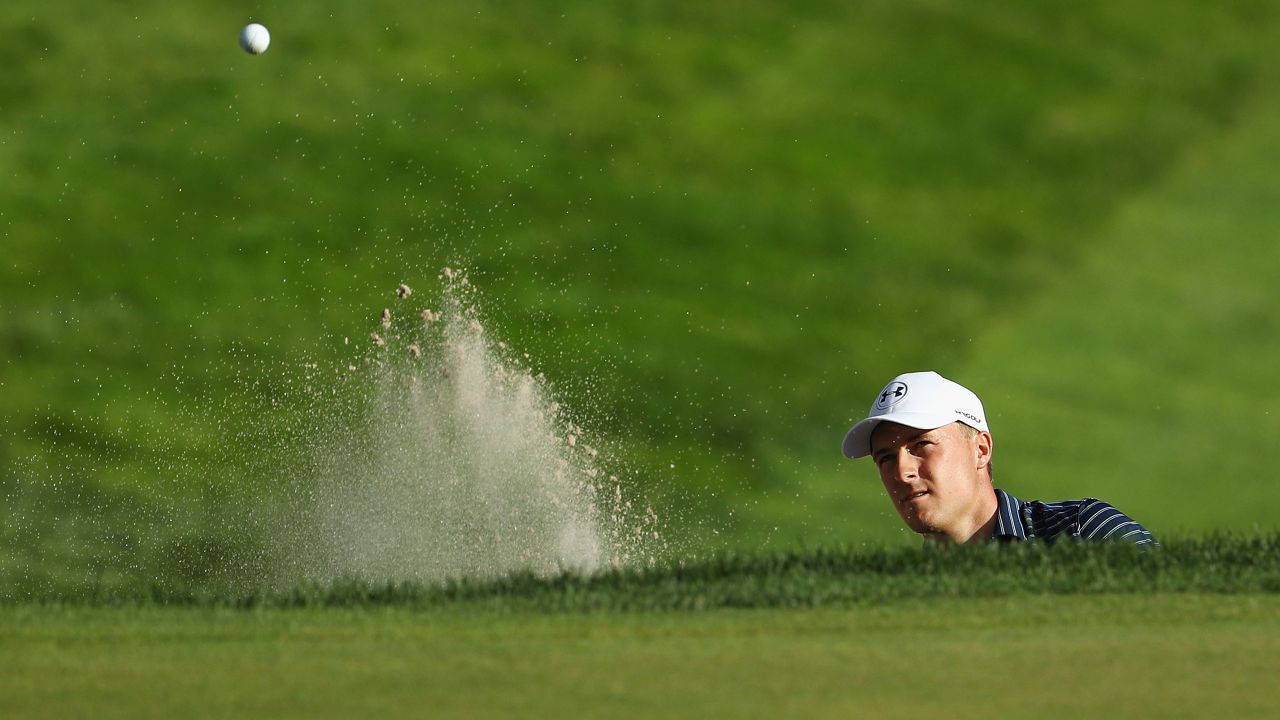 Jordan Spieth found a bunker on the first playoff hole -- the 18th -- against Daniel Berger.  