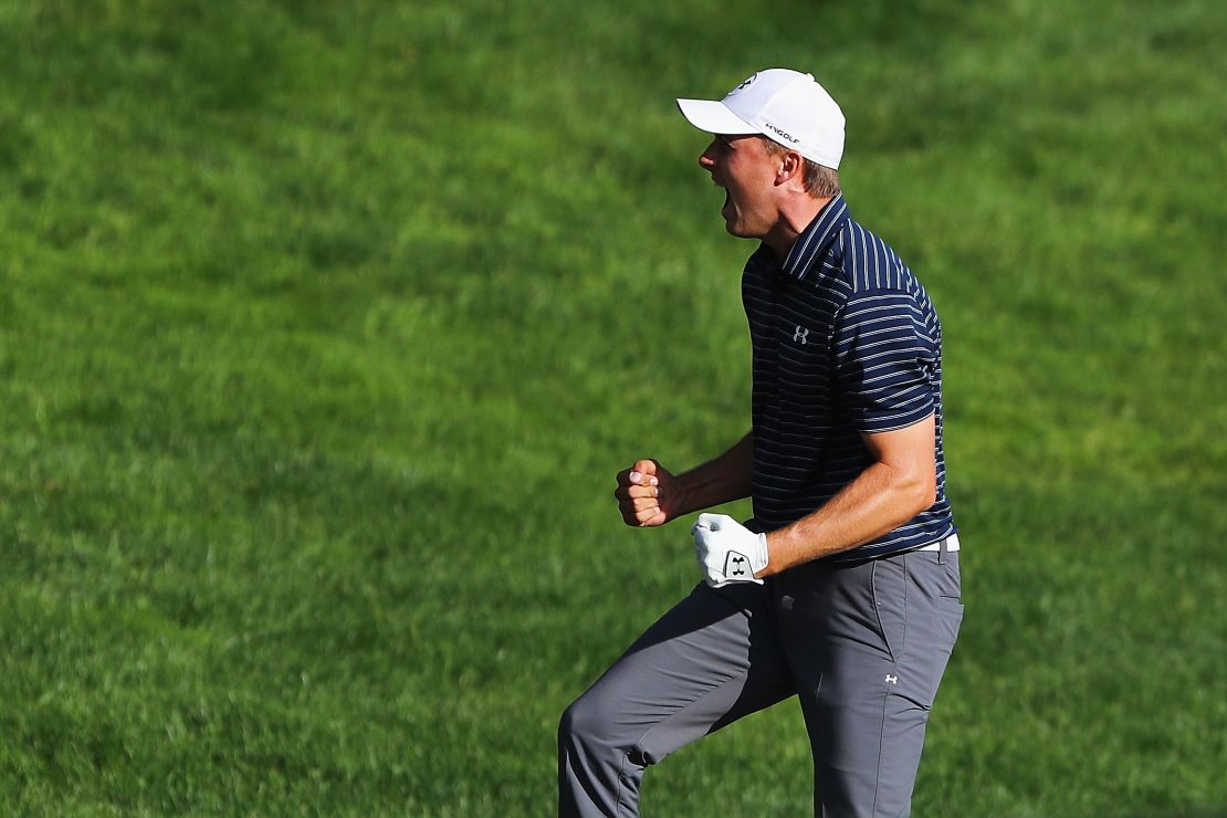 Spieth holed from the sand, forcing Berger to drain a long putt to stay in the playoff.