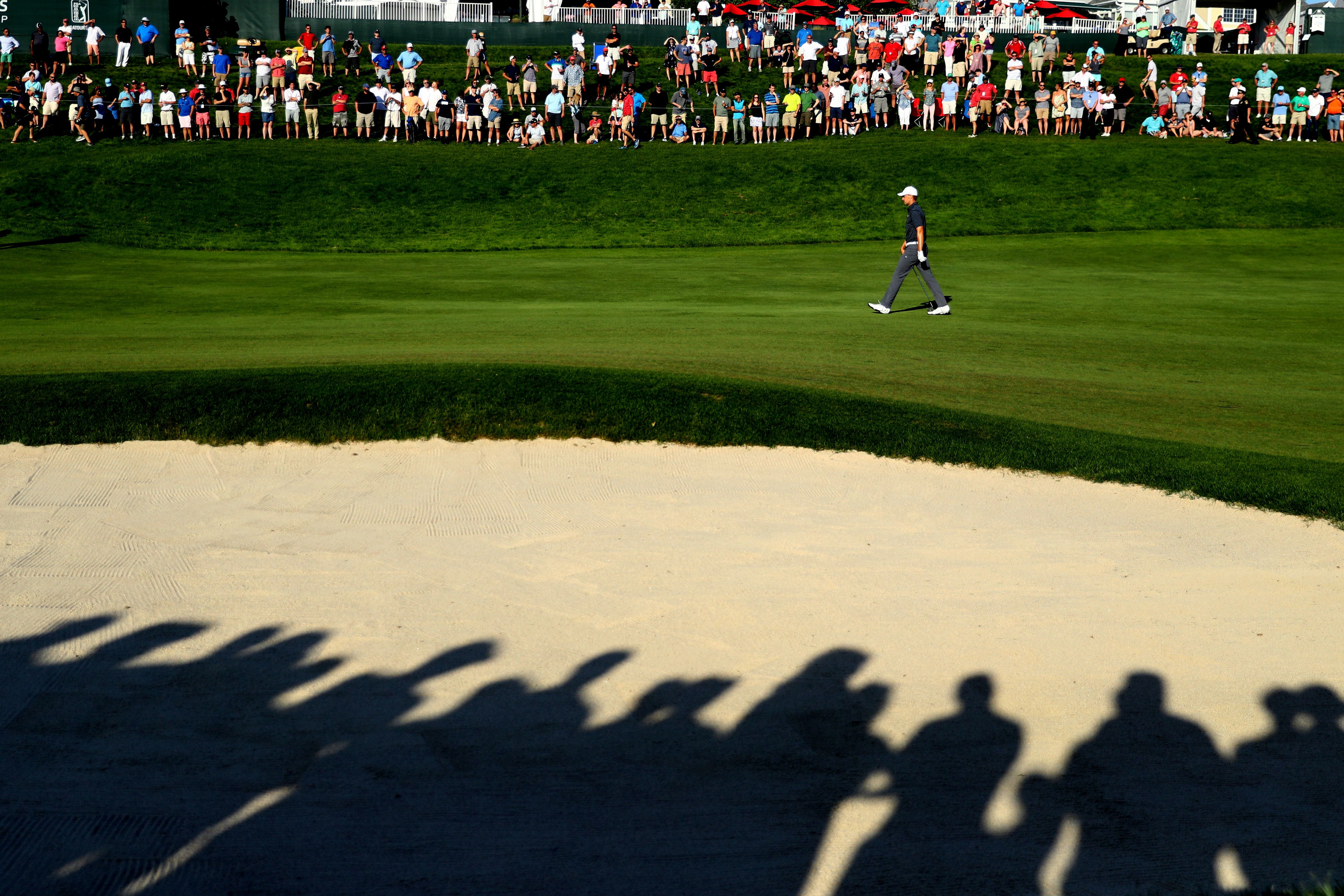 Spieth walks up the 18th fairway during Sunday's final round at TPC River Highlands, Connecticut.