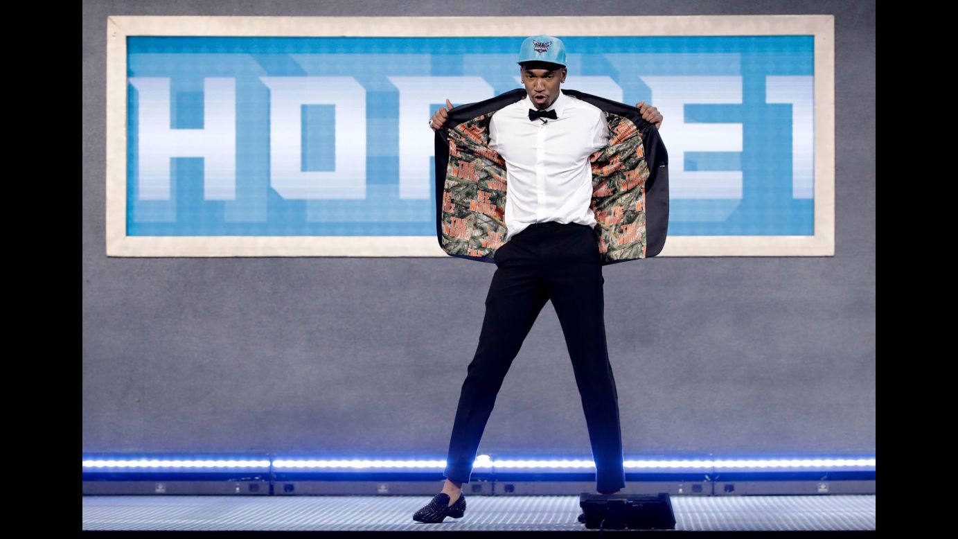 Malik Monk shows off his jacket after the Charlotte Hornets took the former Kentucky star 11th in the NBA Draft on Thursday, June 22. The jacket paid homage to "The Woodz," <a href="http://www.kentucky.com/sports/college/kentucky-sports/ex-cats/article158183989.html" target="_blank" target="_blank">Monk's neighborhood court </a>growing up in Arkansas.