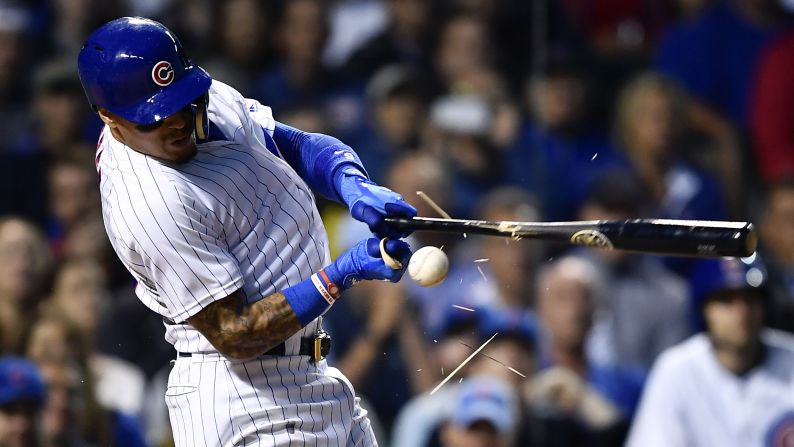 The bat shatters in Javier Baez's hand during a Major League game in Chicago on Tuesday, June 20.