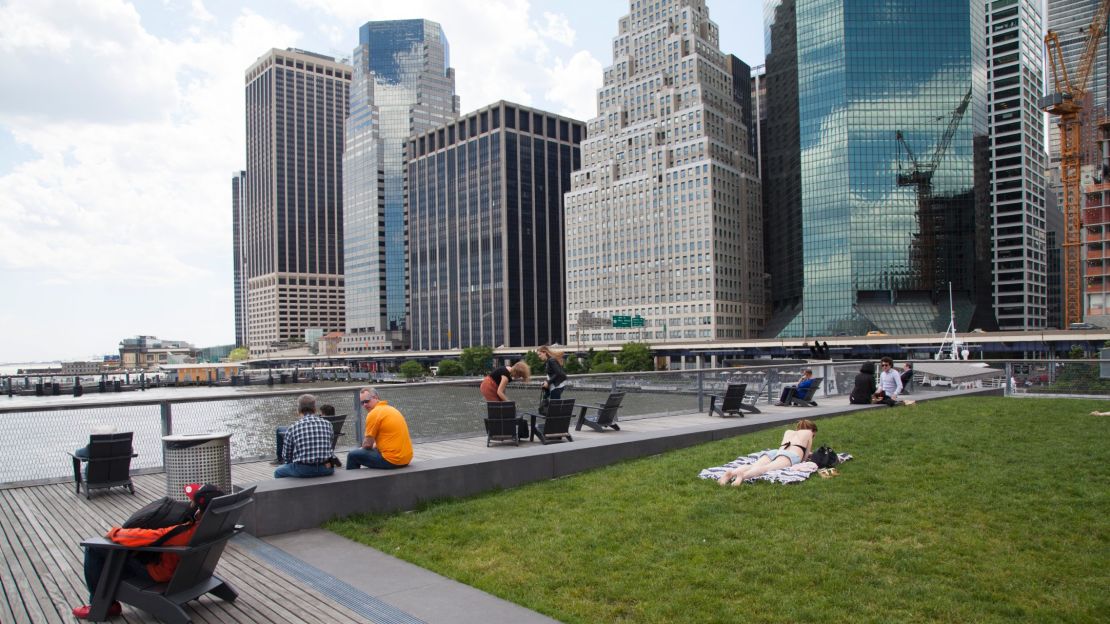 Lower Manhattan workers and residents relax at Pier 15. 