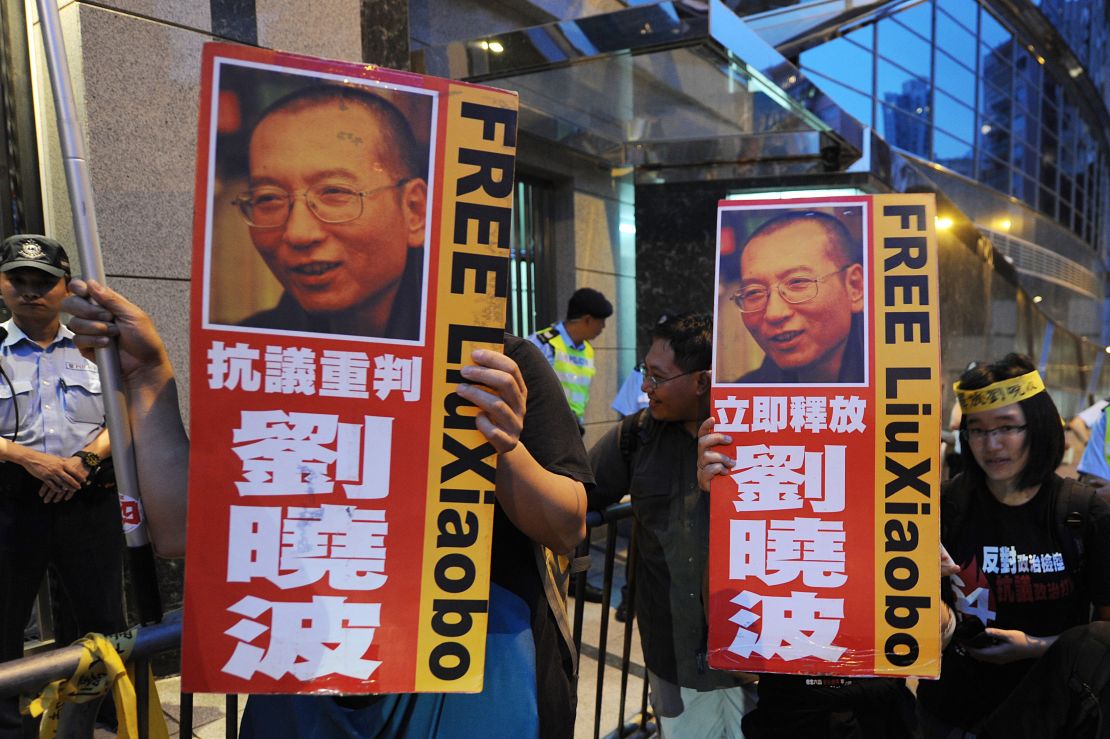 Protestors demonstrate to free Liu Xiaobo outside the Chinese Foreign Ministry in Hong Kong on October 8, 2010.