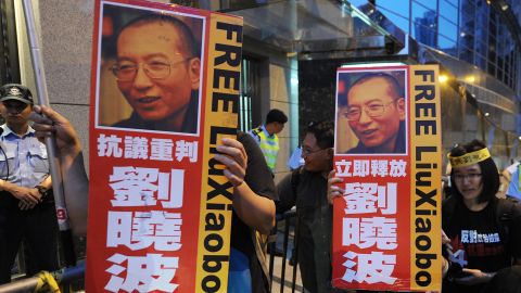 Protestors demonstrate to free Liu Xiaobo outside the Chinese Foreign Ministry in Hong Kong on October 8, 2010.
