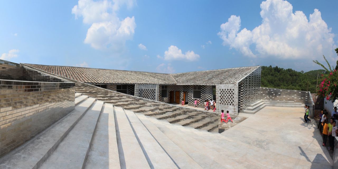 The not-for-profit Rural Urban Framework designs houses, hospitals, schools and other essential buildings for rural communities in China. The staircase at the Mulan Primary School forms part of the playground, though it can also be used for school assemblies and village meetings. 