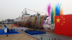 China's new 10,000-tonne guided-missile destroyer enters the water at Shanghai's Jiangnan Shipyard during a launching ceremony on the morning of June 28, 2017. As China's new domestically-produced destroyer, it is equipped with latest air defense, anti-missile, anti-ship and anti-submarine weapon systems. (eng.chinamil.com.cn / Photo by Chen Guoquan and Yin Hang)
