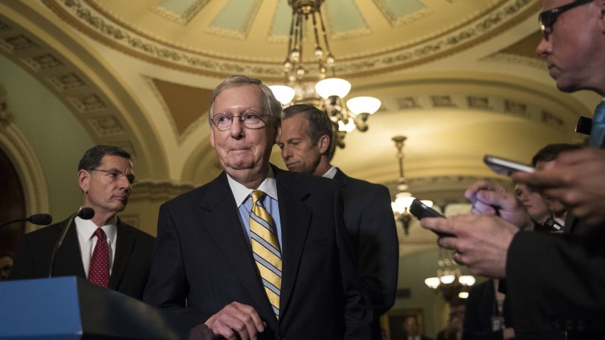 WASHINGTON, DC : (L to R) Senate Majority Leader Mitch McConnell (R-KY) listens to a question during a press conference after a closed-door Senate GOP conference meeting on Capitol Hill, June 27, 2017 in Washington, DC. The Senate GOP announced they will delay a vote on their health care bill until after the July 4 recess. (Drew Angerer/Getty Images)