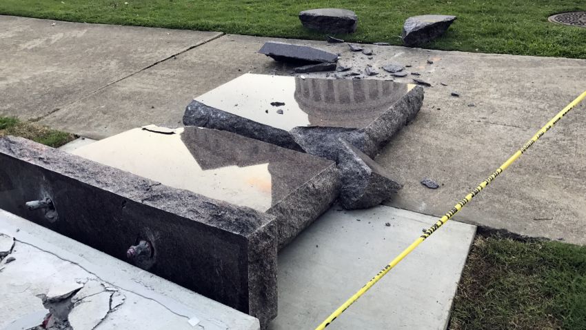 The new Ten Commandments monument outside the state Capitol in Little Rock, Ark., is blocked off Wednesday morning, June 28, 2017, after someone crashed into it with a vehicle, less than 24 hours after the privately funded monument was installed on the Capitol grounds. Authorities arrested a male suspect. (AP Photo/Jill Zeman Bleed)