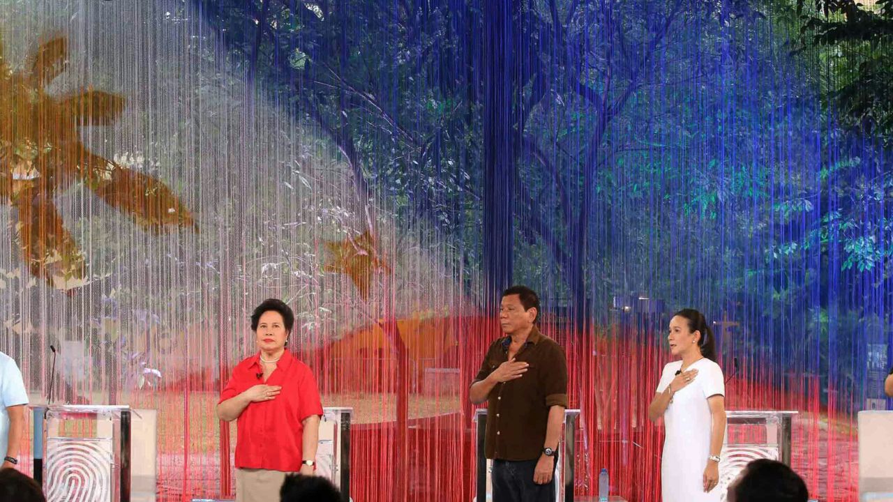 Philippines President Rodrigo Duterte (center) before the start of the presidential debate before his election in April 2016.