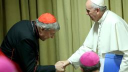 VATICAN CITY, VATICAN - OCTOBER 20:  Pope Francis greets Australian Cardinal George Pell as he arrives at the Synod Hall for a session of Synod on The Themes Of Family on October 20, 2015 in Vatican City, Vatican. The Synod of Bishops on the family moves into its third and final week. Over the first two weeks the Church leaders have been seeking to resolve tensions between the different visions of family life and ministry.  (Photo by Franco Origlia/Getty Images)