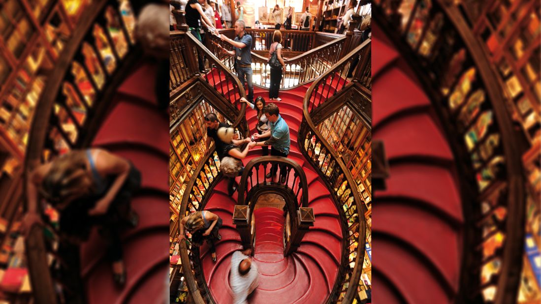 <strong>Livraria Lello: </strong>Crimson curved staircases, wood-carved handrails, a stained-glass skylight and Art Deco detailing on walls are some of the features that make Lello a city icon for more than a century. 