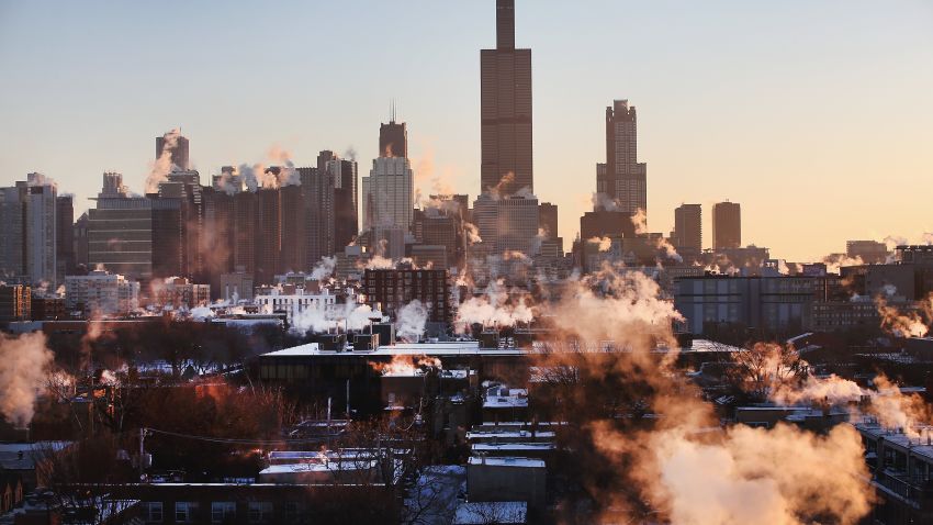 CHICAGO, IL - JANUARY 28:  The sun rises behind the skyline as temperatures hovered around -10 degrees January 28, 2014 in Chicago, Illinois. The city has had 18 days at or below zero so far this winter, two shy of the 20-day record.  (Photo by Scott Olson/Getty Images)