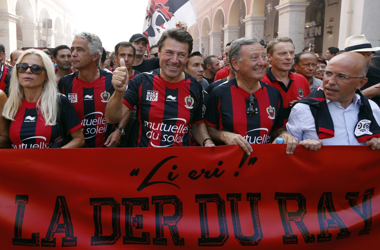 OGC Nice president Jean-Pierre Rivère (second from left) marches with city leaders at a club rally in 2013. "We all live in Nice, we have all been impacted directly or indirectly, and we cannot imagine that this could happen in a place like that at this moment, with children and women, it's terrible," Rivère told CNN. 