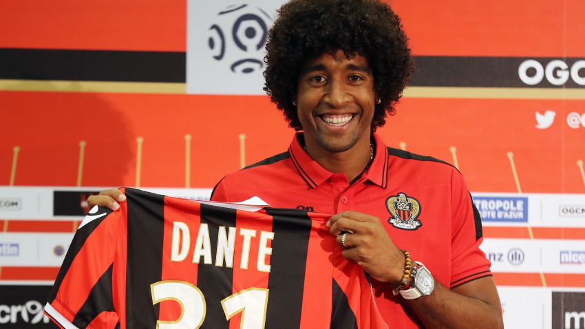 Nice's defender Brazilian Dante poses with a new jersey after a press conference on August 24, 2016 at the 
