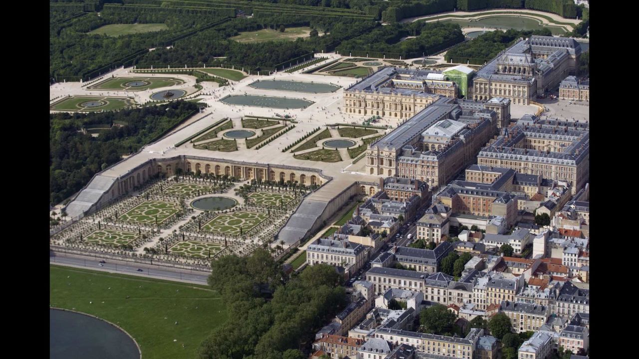 An aerial view shows Versailles and its gardens. Construction of the palace, a few miles west of Paris, began in 1661.