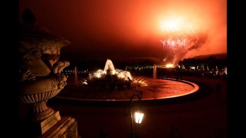 Fireworks light the sky in front of the Grand Canal during the Night Fountains show in the palace gardens.