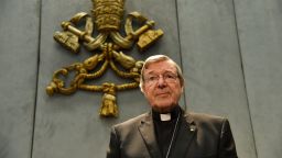 Australian Cardinal George Pell looks on as he makes a statement at the Holy See Press Office, Vatican city on June 29, 2017 after being charged with historical child sex offences in a case that has rocked the church.
Cardinal Pell says on June 29 that he will return to Australia to face sex abuse charges. / AFP PHOTO / Alberto PIZZOLI        (Photo credit should read ALBERTO PIZZOLI/AFP/Getty Images)