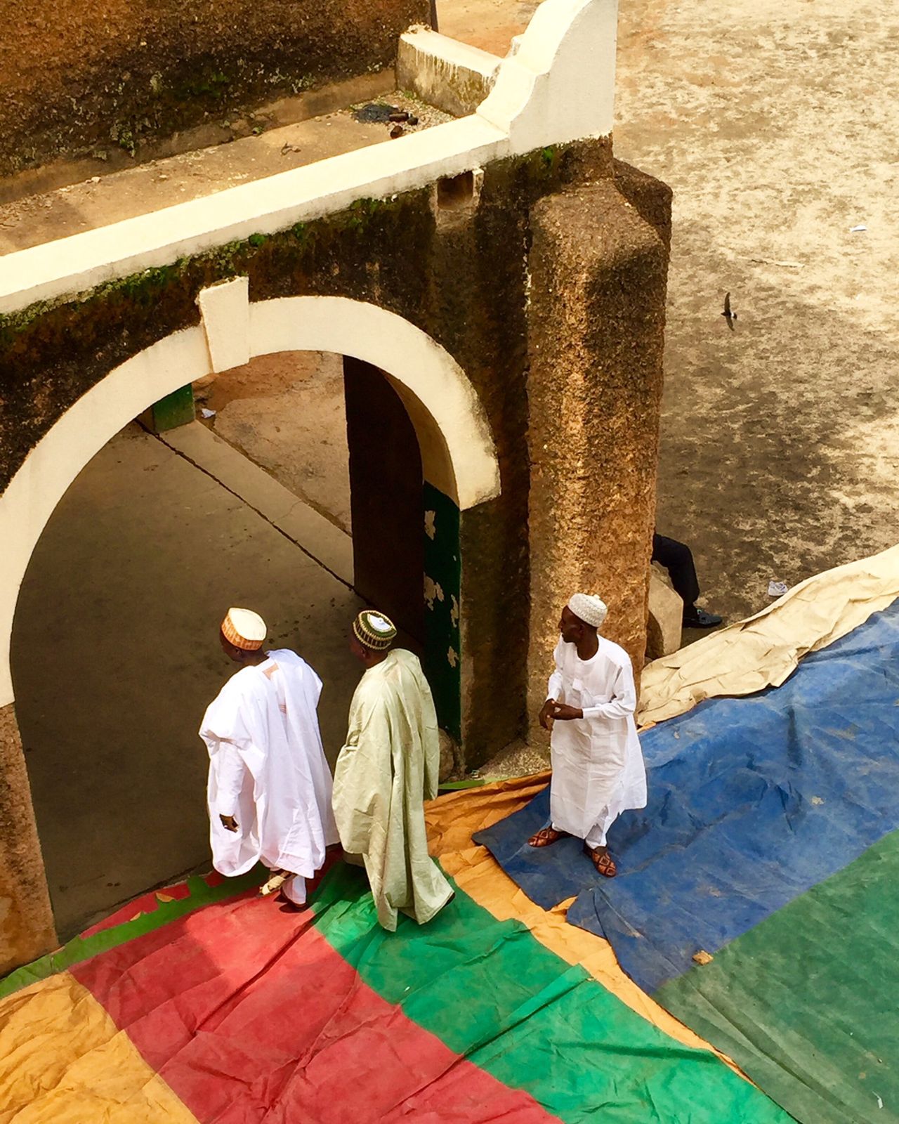 Before the Durbar begins, officials dress the grounds to receive dignitaries attending the ceremony at the Emir's palace.<br />