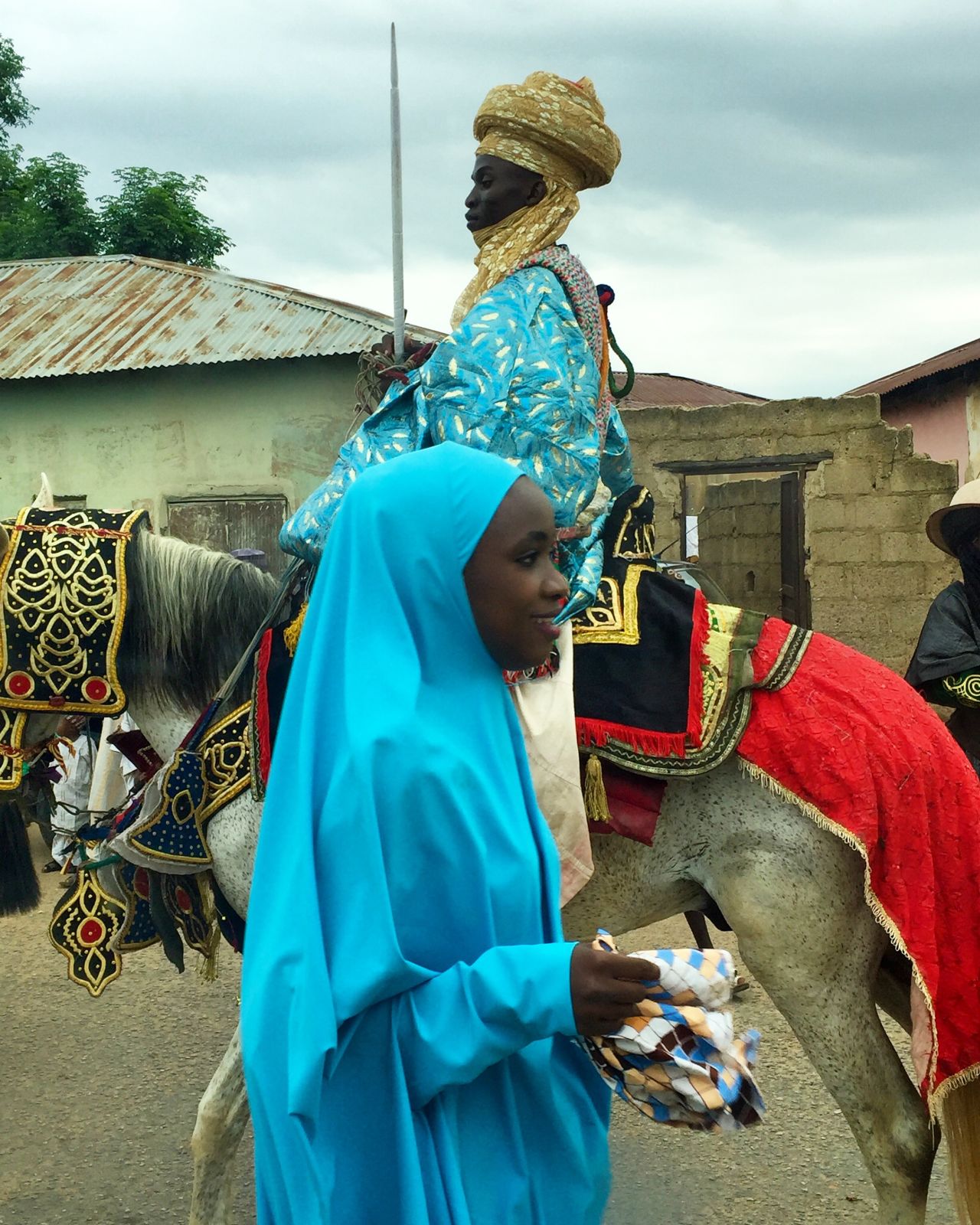 As the Durbar is often held to commemorate Eid celebrations, people typically visit mosques for prayers before joining the crowds gathering towards the Emir's palace. <br />