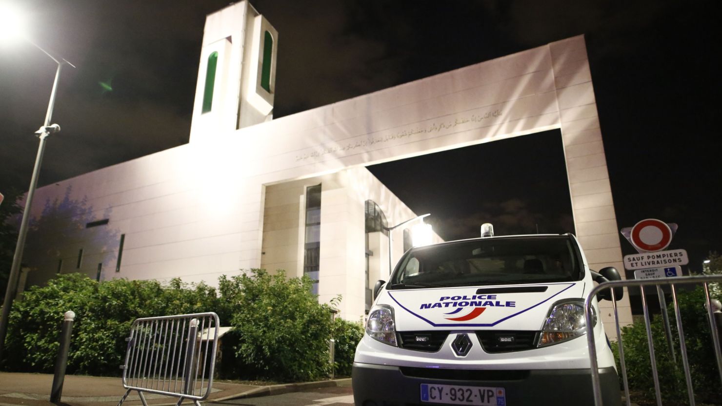 A police vehicle is stationed outside a mosque June 29, 2017 in the Paris suburb of Creteil after a man tried to drive a car into a crowd in front of the Islamic religious facility.  