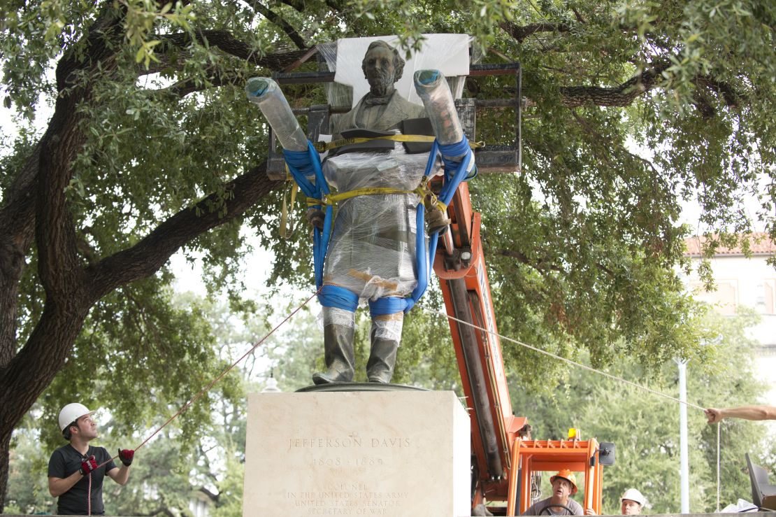 A statue of Confederate leader Jefferson Davis is removed in 2015 from University of Texas' South Mall.