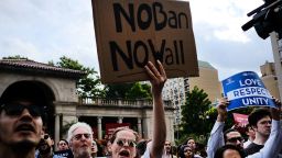 Recent Immigrants join activists for an evening protest in Manhattan hours before a revised version of President Donald Trump's travel ban that was approved by the Supreme Court is to take effect on June 29, 2017 in New York City. 