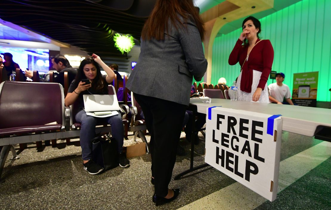 Lawyers offer free legal advice inside the international arrivals area at LAX.