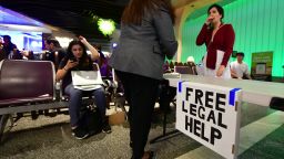A table is setup for lawyers offering free legal advice inside the International Arrivals section at Los Angeles International Airport on June 29, 2017, where activists protested President Donald Trump's ban temporarily barring entry into the US from Libya, Iran, Somalia, Sudan, Syria and Yemen. 
The ban prevents the issuance of visas to travelers from the six countries for 90 days and places the refugee-entry program on hold for 120 days. / AFP PHOTO / FREDERIC J. BROWN        (Photo credit should read FREDERIC J. BROWN/AFP/Getty Images)