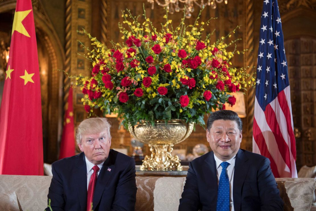 US President Donald Trump (L) sits with Xi during a bilateral meeting at the Mar-a-Lago estate in Florida, on April 6.