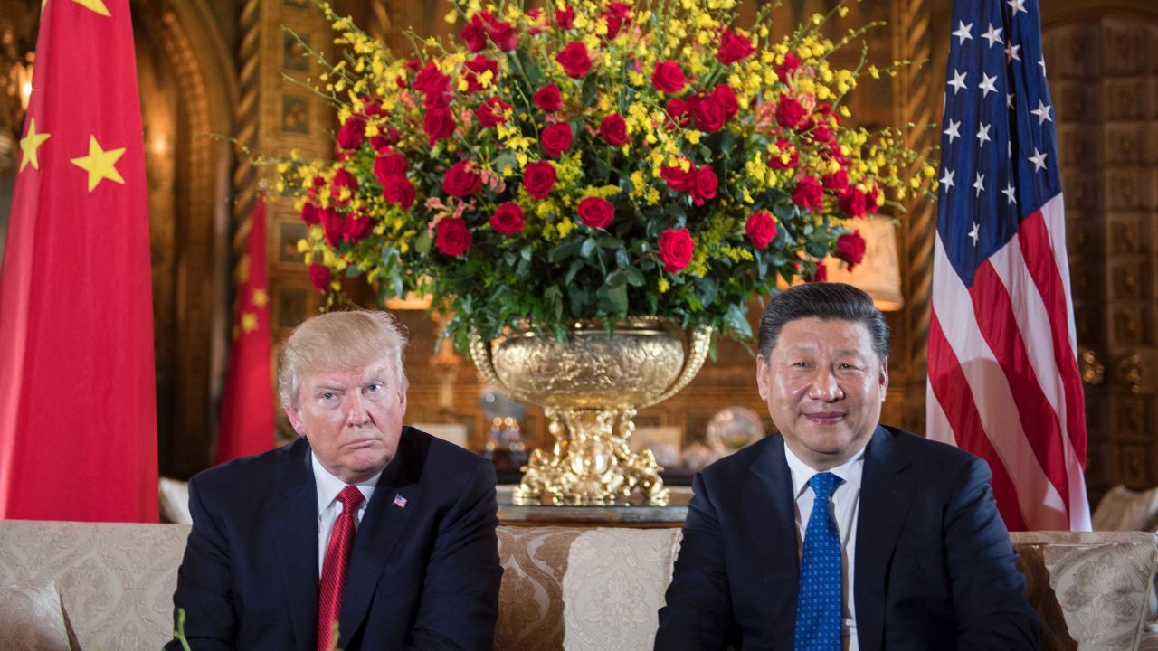 (FILES) US President Donald Trump (L) sits with Chinese President Xi Jinping (R) during a bilateral meeting at the Mar-a-Lago estate in West Palm Beach, Florida, on April 6, 2017.
While the new US president has shown a capacity to change, both his tone and his positions, he has been unable to show the world a "new" Trump, with a steady presidential style and a clearly articulated worldview. As the symbolic milestone of his 100th day in power, which falls on April 29, 2017, draws near, a cold, hard reality is setting in for the billionaire businessman who promised Americans he would "win, win, win" for them. At this stage of his presidency, he is the least popular US leader in modern history (even if his core supporters are still totally behind him.) / AFP PHOTO / JIM WATSON / TO GO WITH AFP STORY, US-politics-Trump-100days         (Photo credit should read JIM WATSON/AFP/Getty Images)