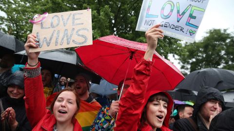 Supporters of gay rights celebrate following the vote Friday at the nearby Bundestag.