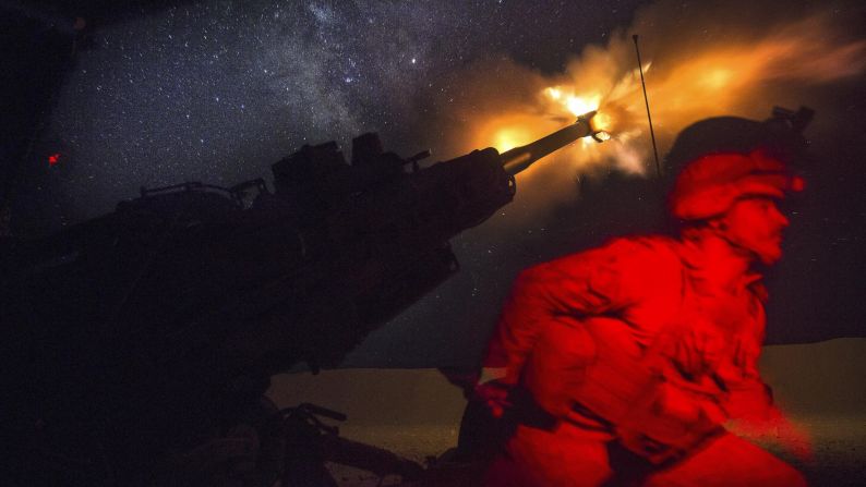 A Marine fires an M777A2 howitzer in the early morning in Syria, Saturday, June 3. Marines have been conducting 24-hour all-weather fire support for the coalition's local partners, the Syrian Democratic Forces. It's to support Combined Joint Task Force Operation Inherent Resolve. Marine Corps photo by Sgt. Matthew Callahan.